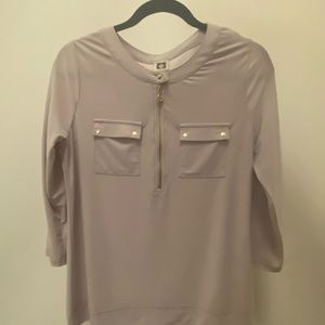 Light purple top with gold detail